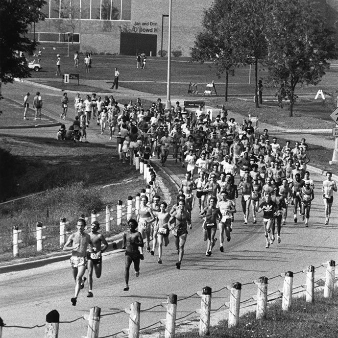 Runners running along path
