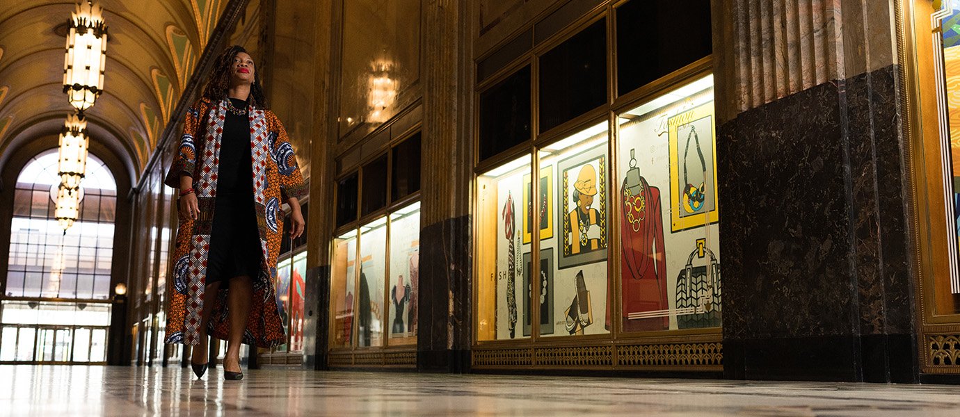 Woman walking through hallway