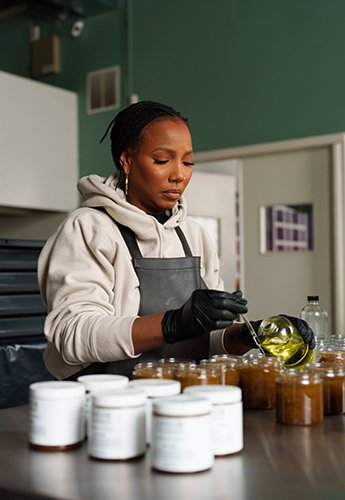 A woman working on beauty products