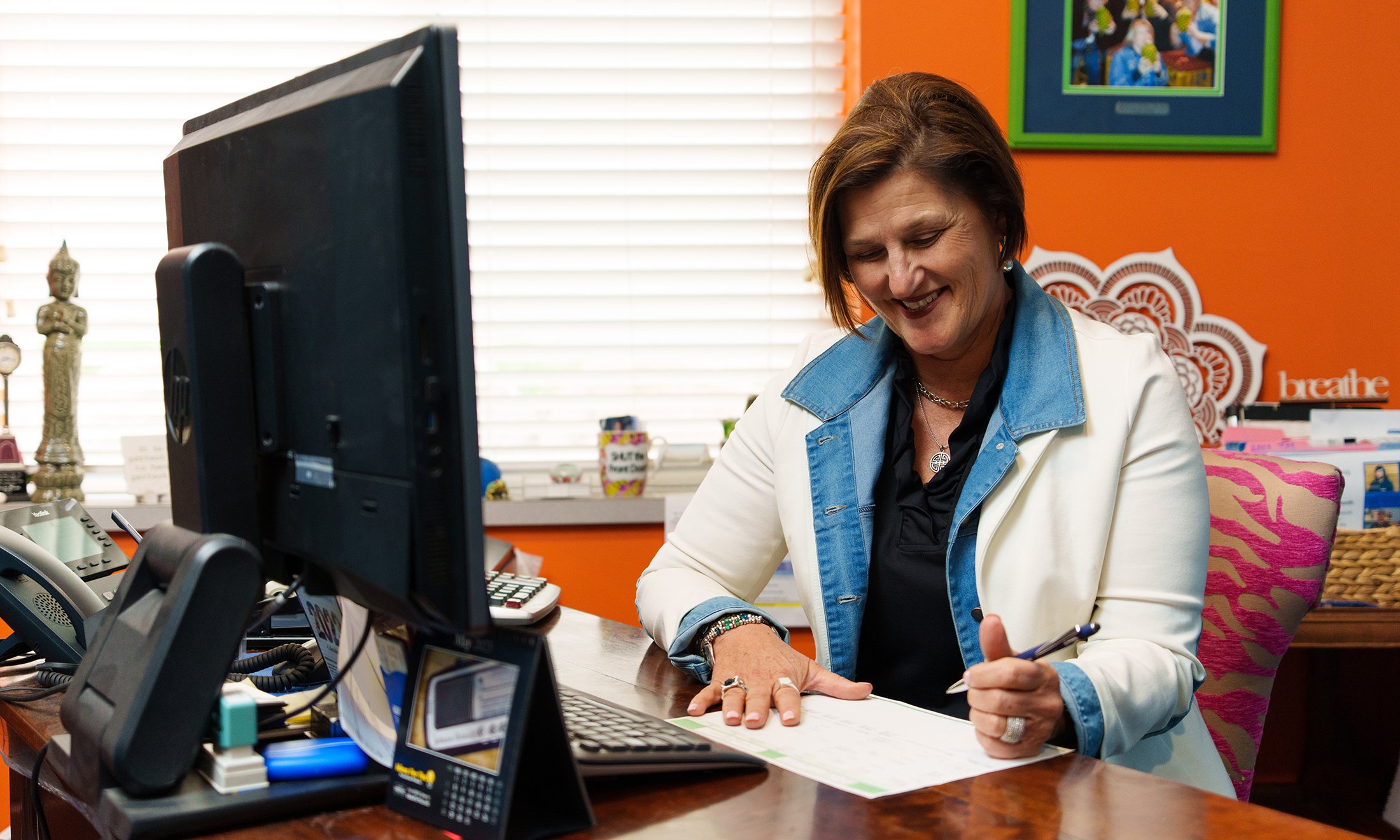 A woman working at her computer