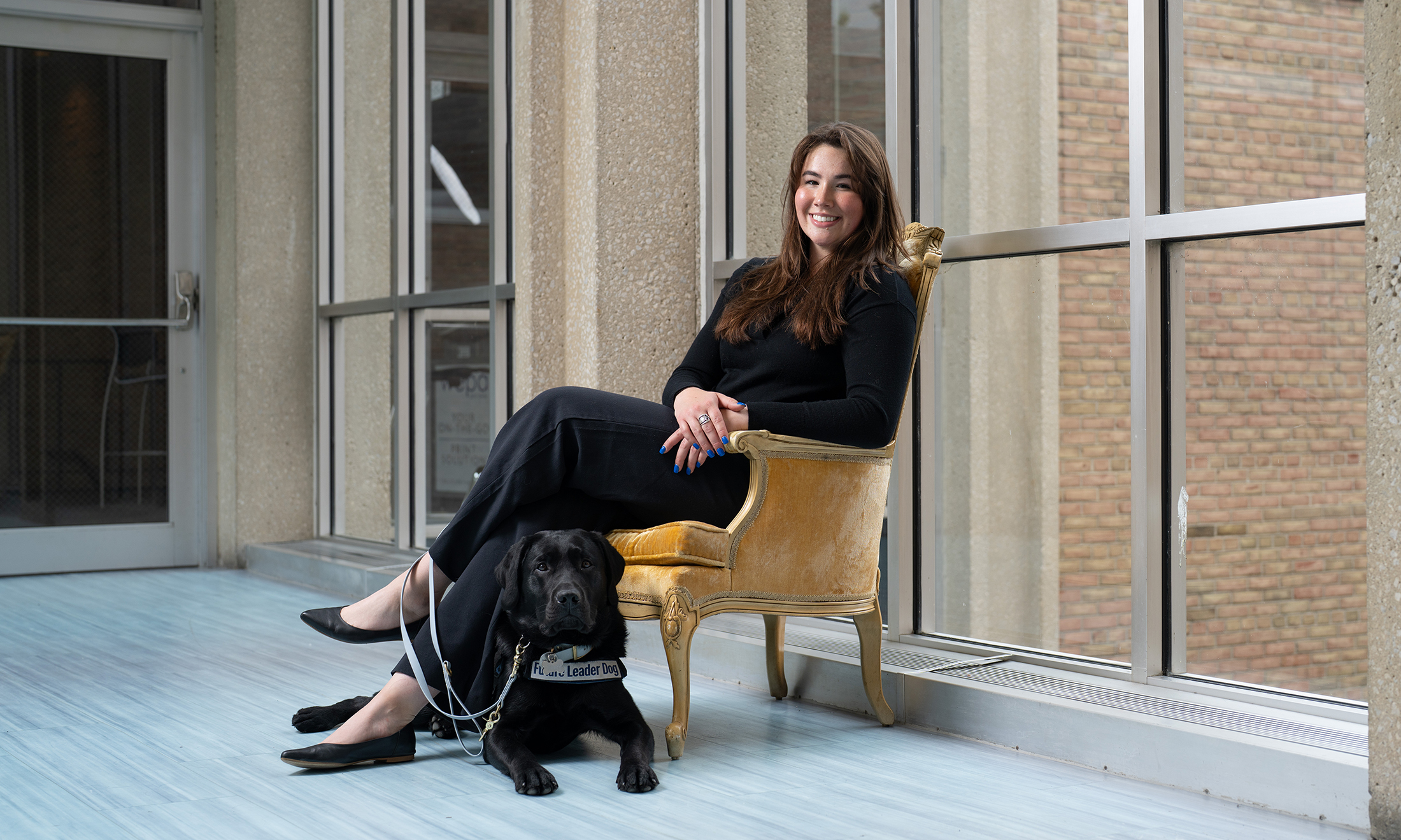 Woman in chair with dog