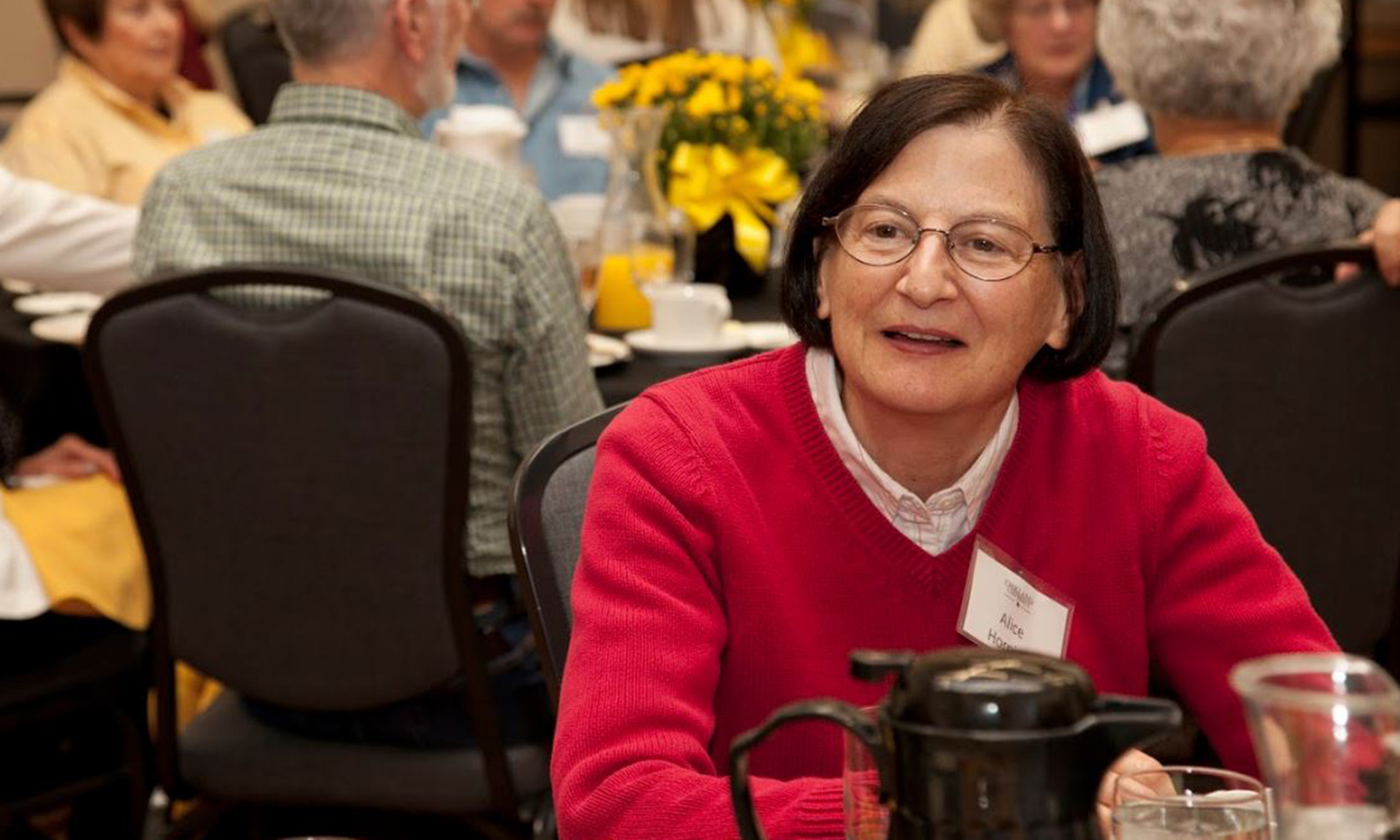 A woman sitting at a table