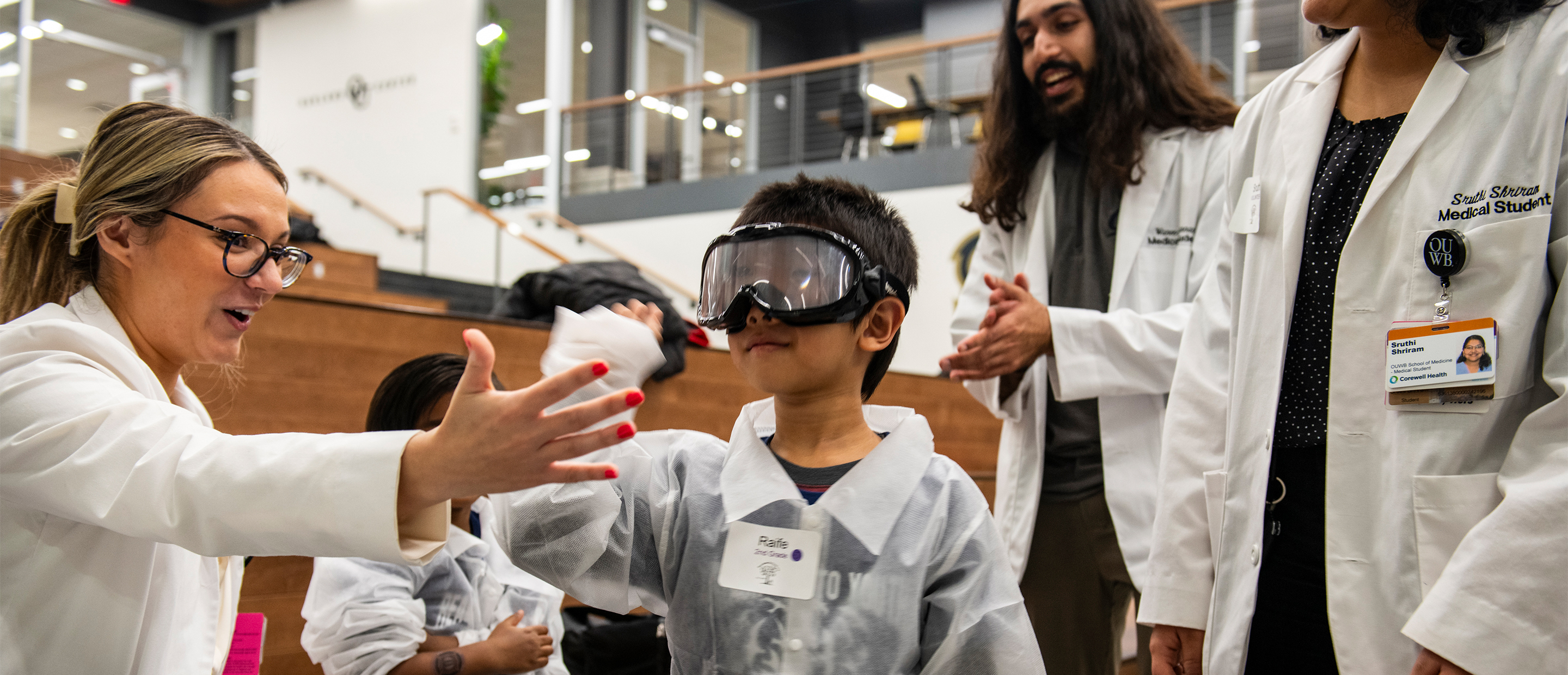 An image of medical students at a community event