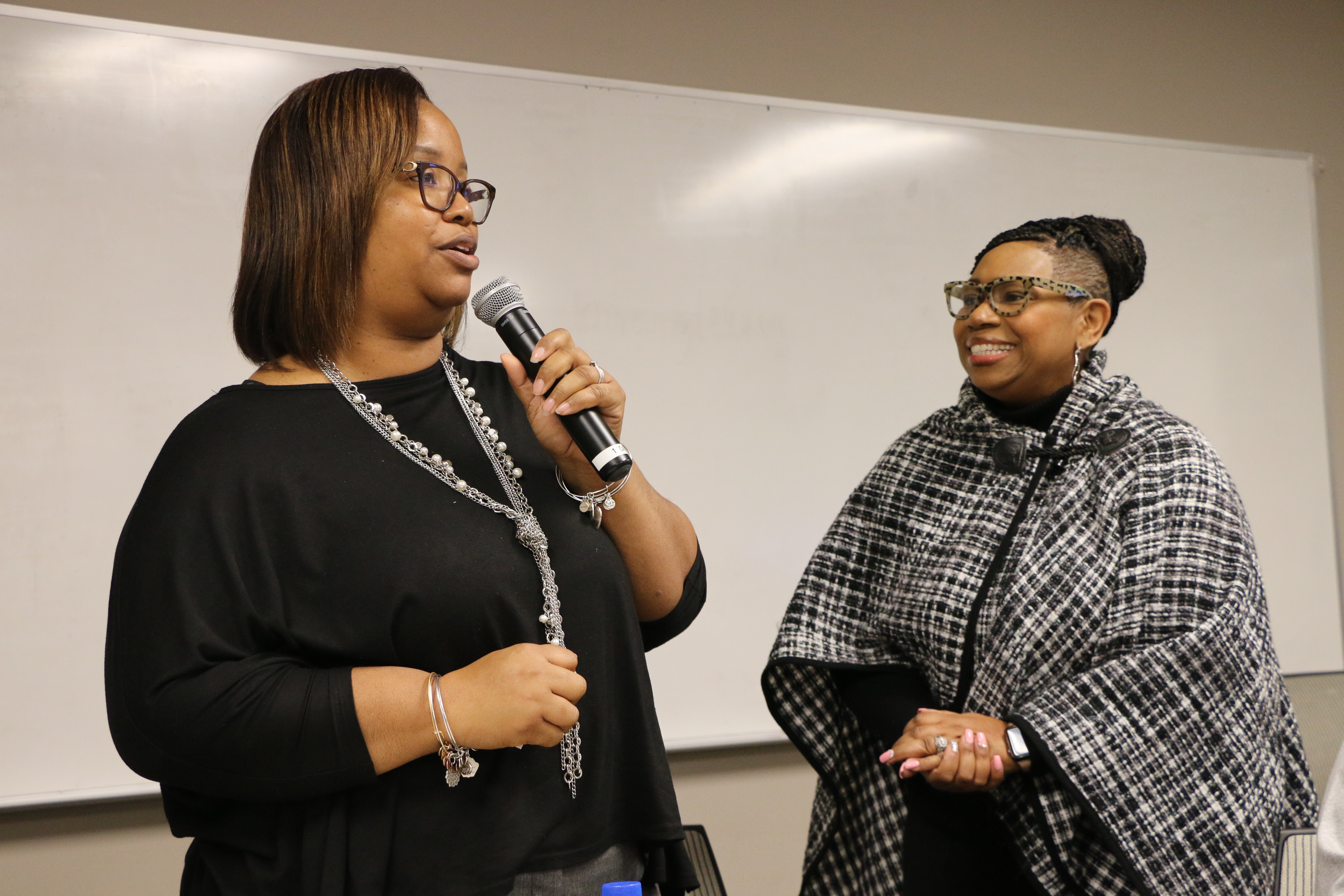 An image of one person introducing another person