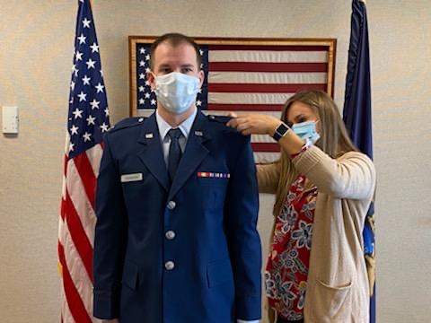 An image of a student being pinned