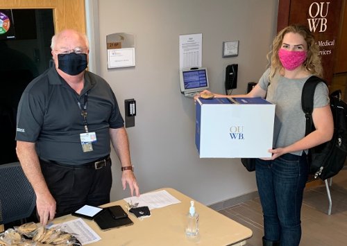 An image of Dean Mezwa and a new student