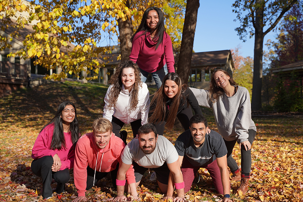 An image of volunteers pose for a photo
