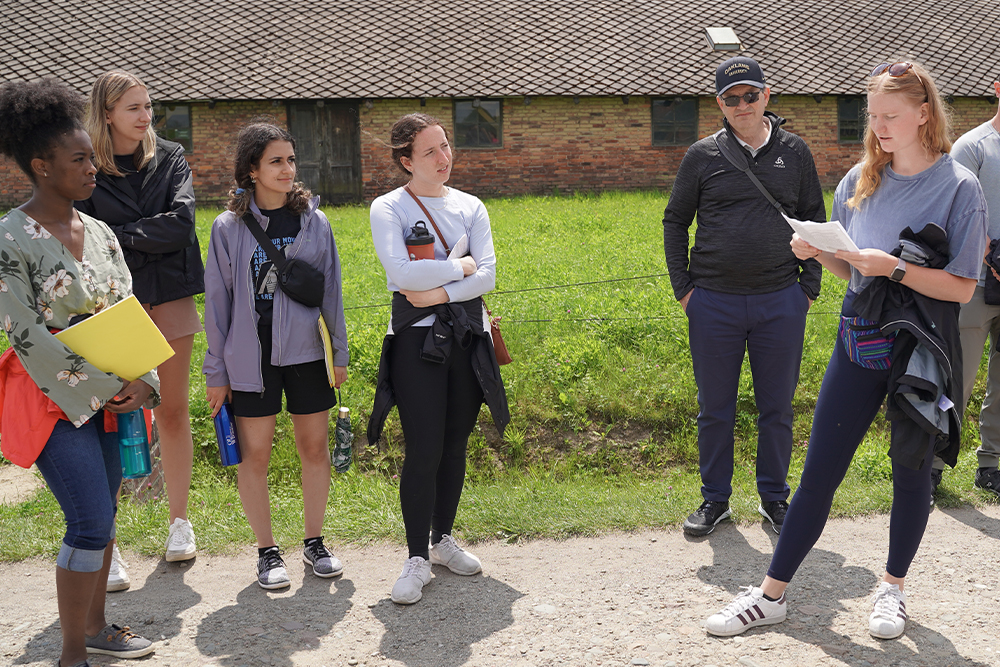 An image of OUWB students and faculty at Auschwitz-Birkenau