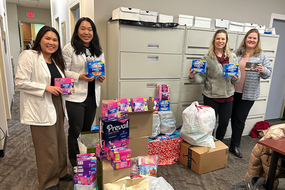 An image of the group behind the drive