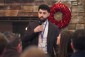 A student speaks to a crowd at the event