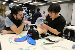 Dr. Eric Battista and Matt Su at the skills night event