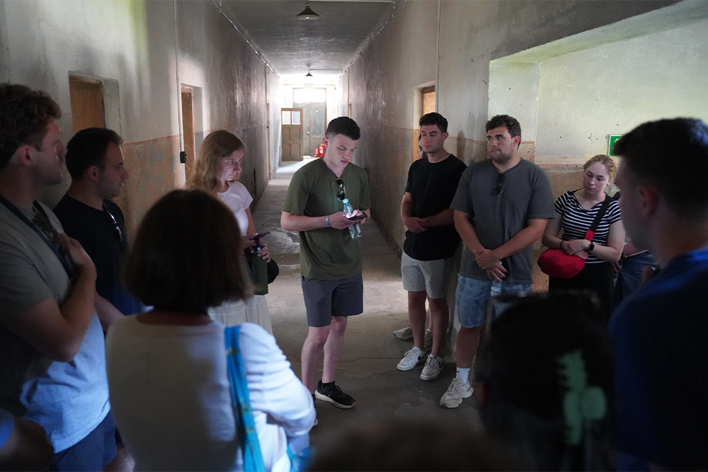 Eli Grey reads a testimonial in Block 10