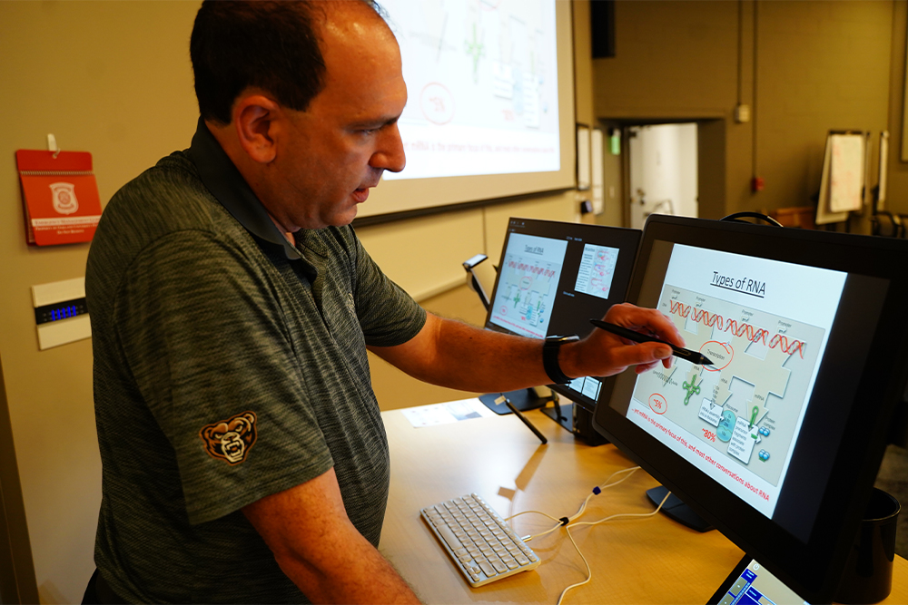 Adam Gordon demonstrates a new touchscreen