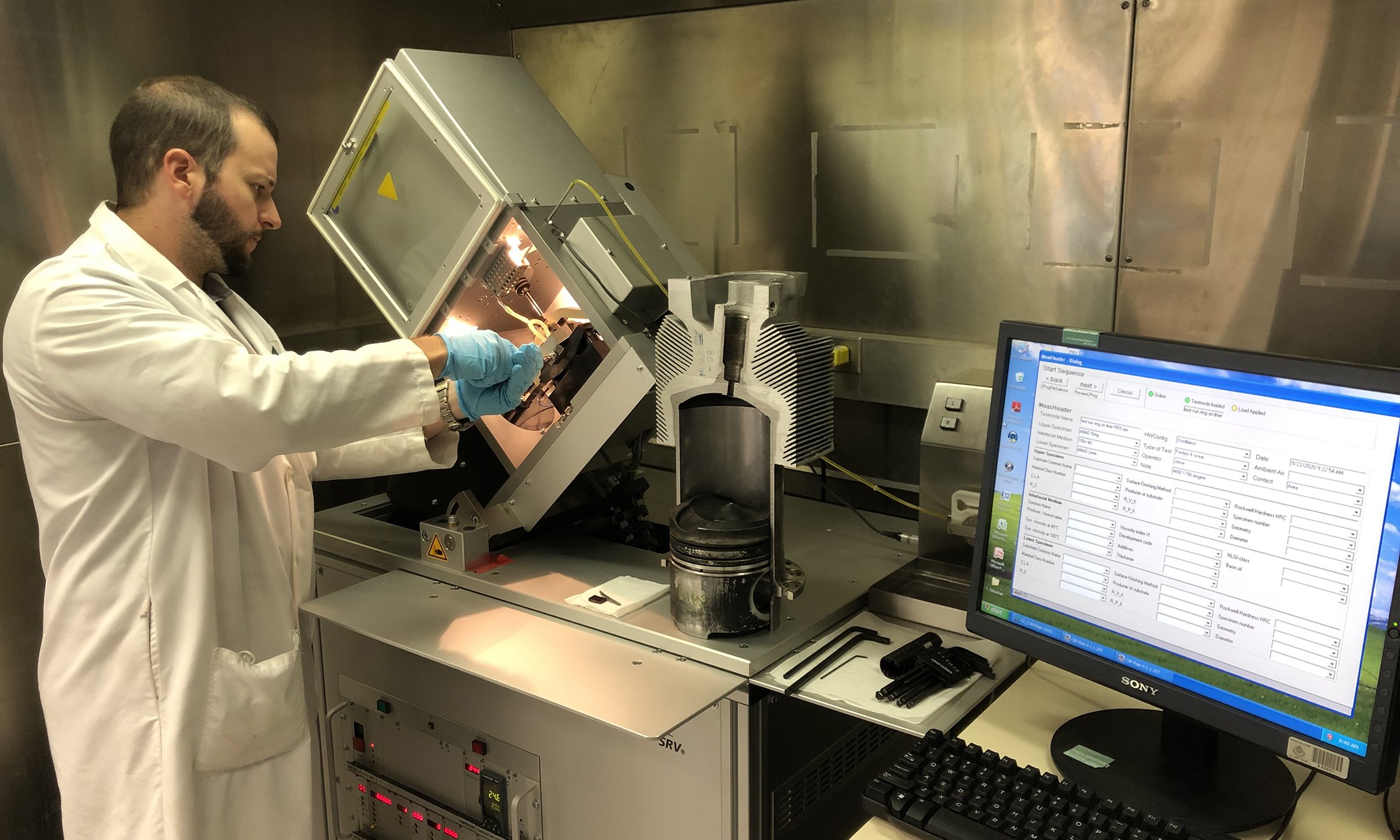 Image of Dr. Thrush, A U.S. Army employee and OU doctoral student In a Lab