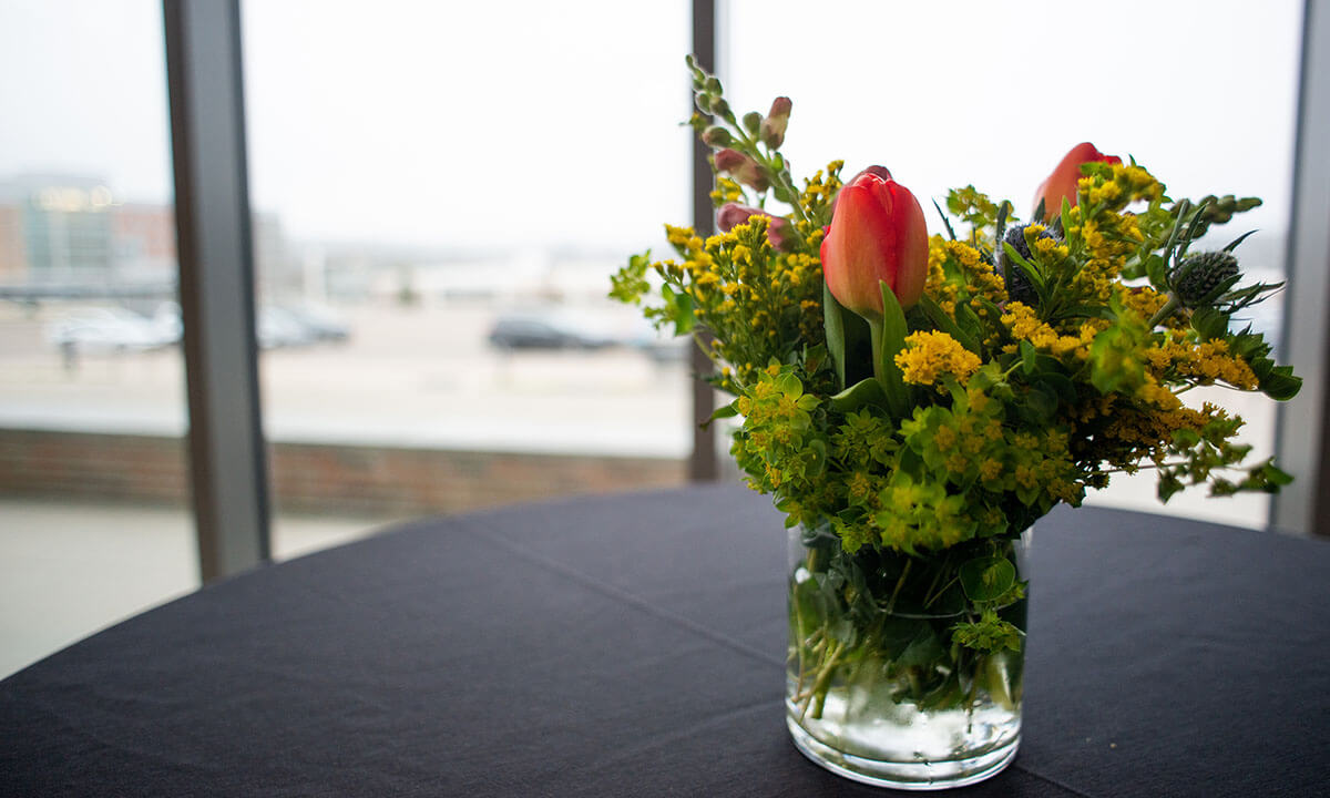 Flowers in vase on table.