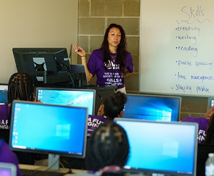 Image of a Teacher engaging GEA participants over a four-week period