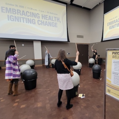 A group fitness drumming class at Oakland University