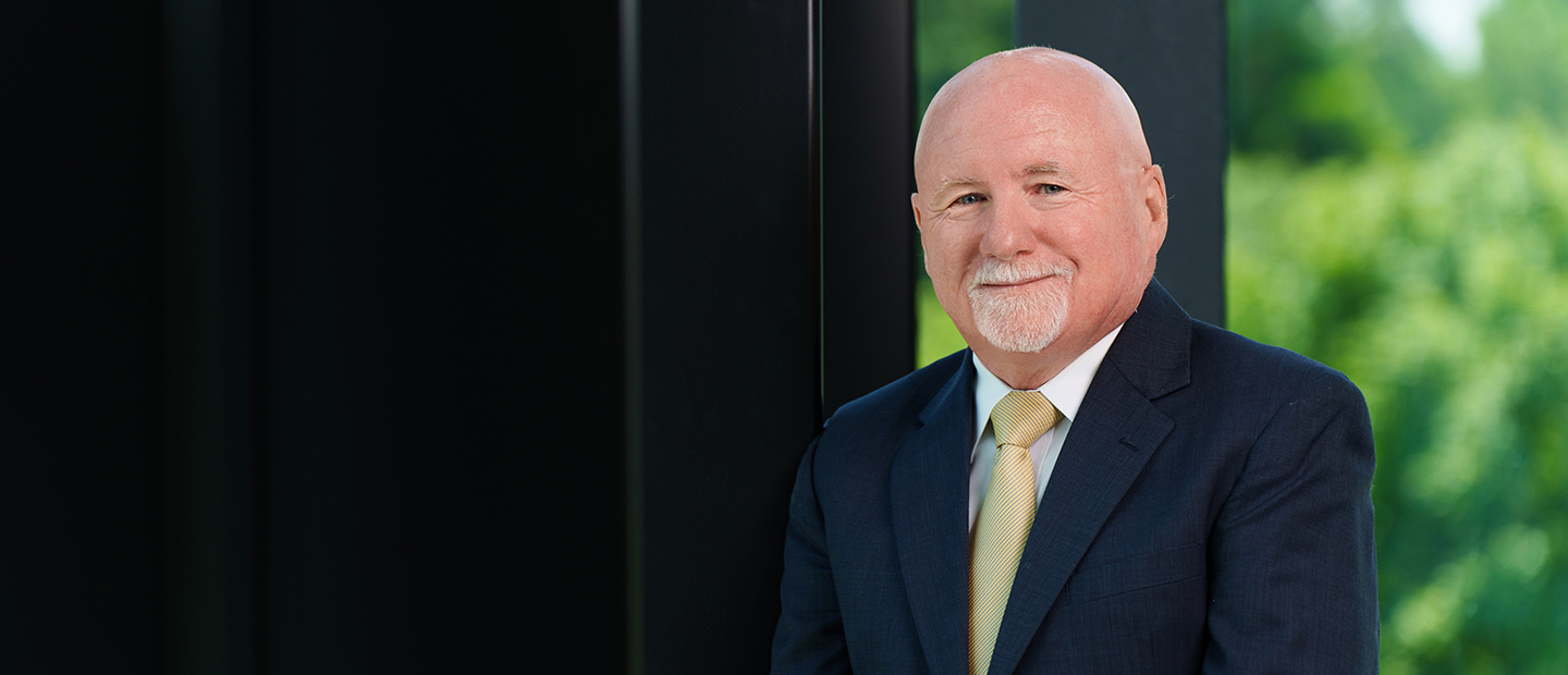 Oakland University Provost, Dr. Kevin Corcoran, smiling at the camera.