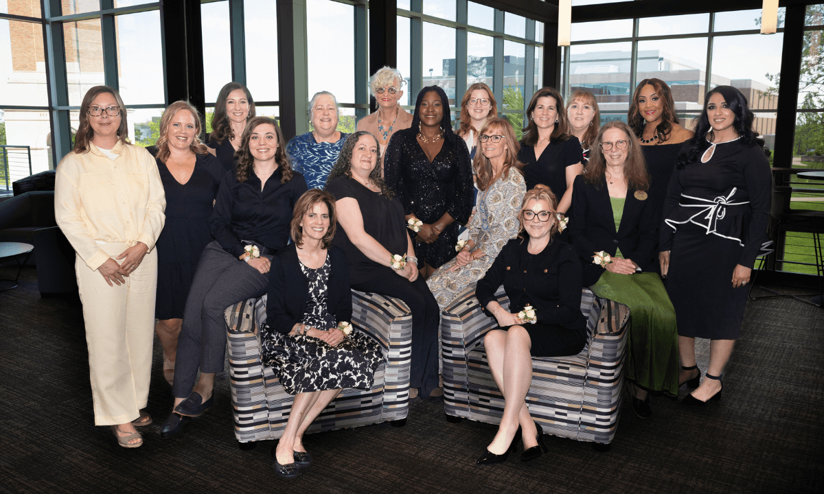 A group of women smiling.