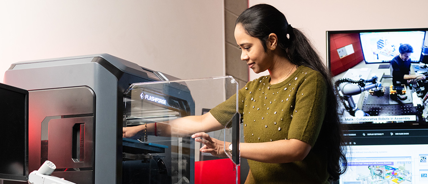 A woman working in an industrial lab