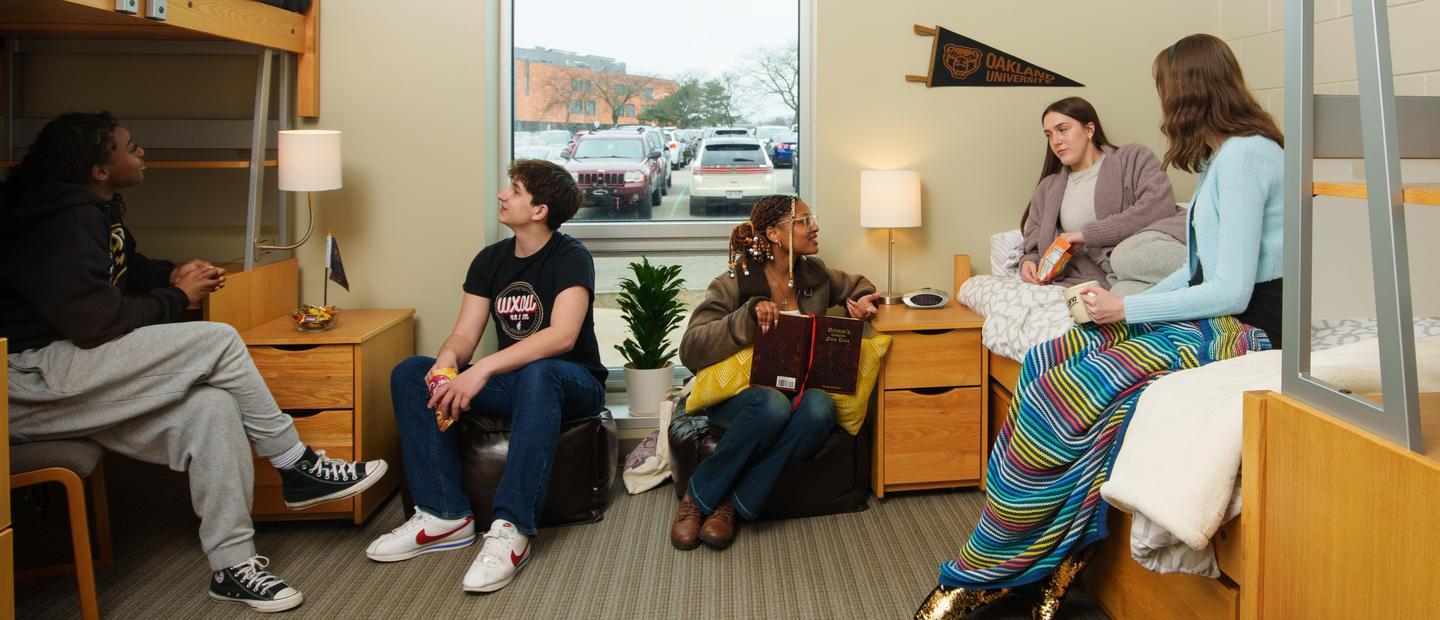 Oakland University students in a dorm room